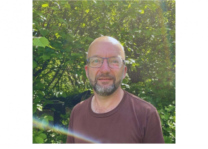 David Walker, a white man with a grey beard and glasses